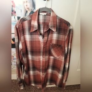 LaMiel burnt orange plaid oversized flannel.